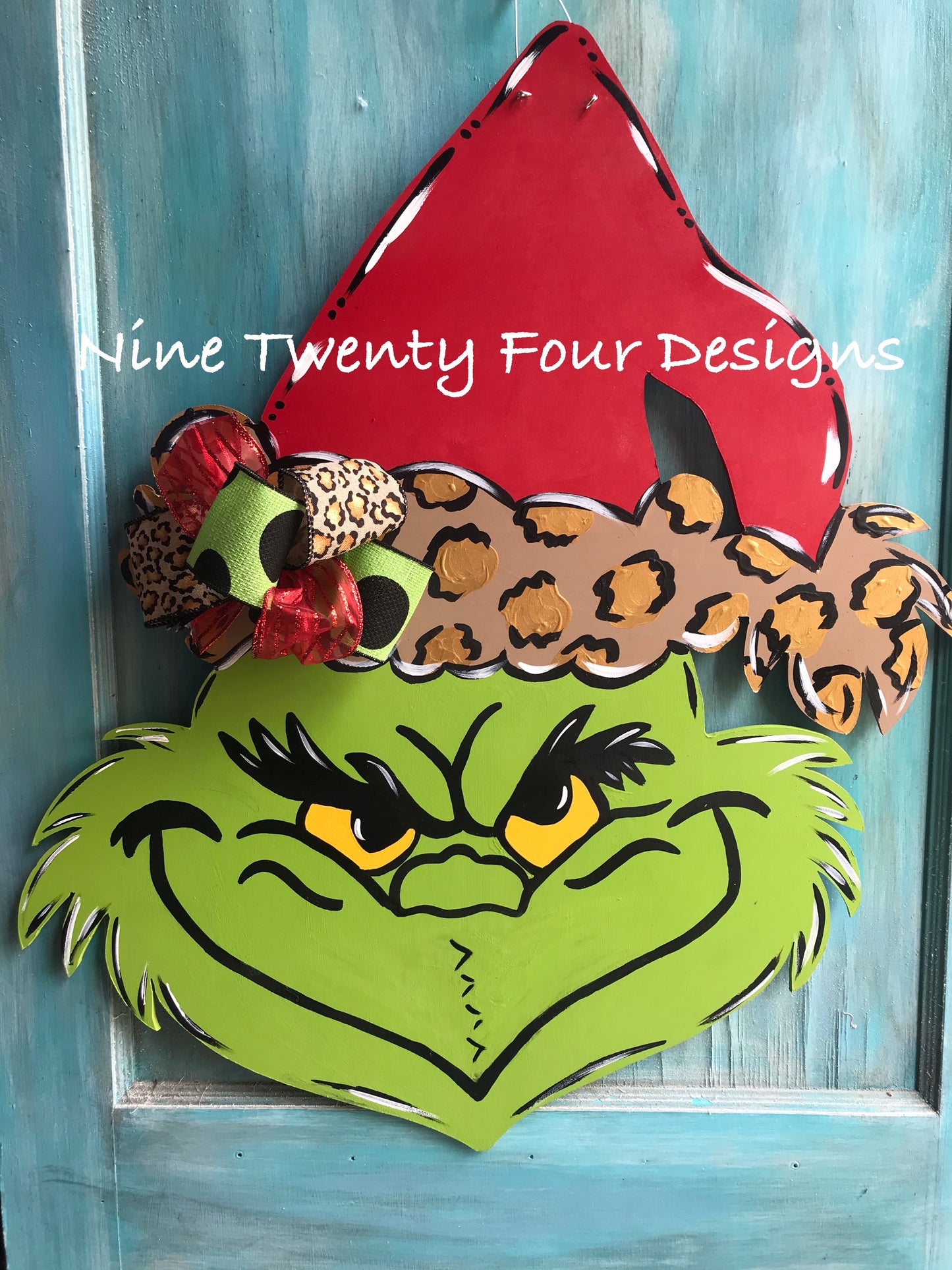Leopard grinch door hanger