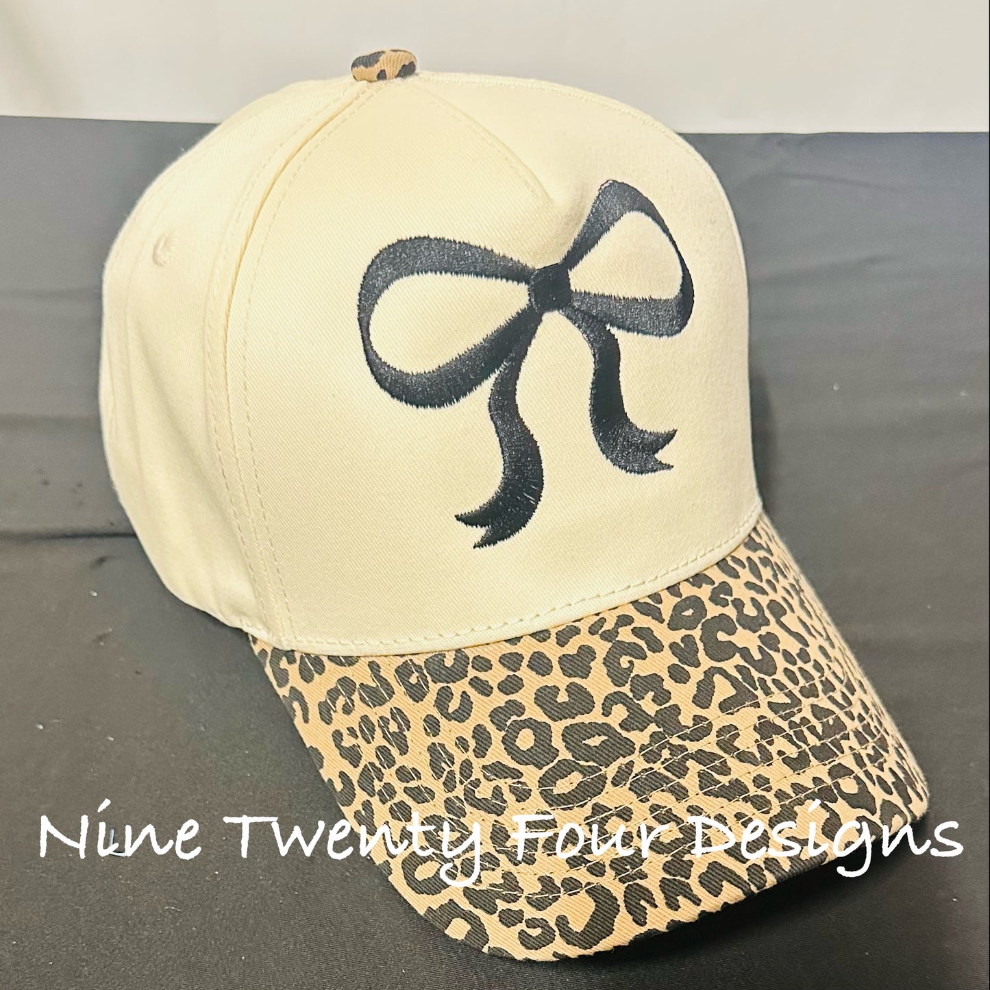 Embroidered bow leopard ballcap